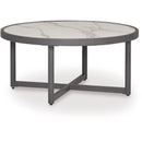  Signature Design by Ashley Ocean Beach PCP510-708 Round Cocktail Table IMAGE 1